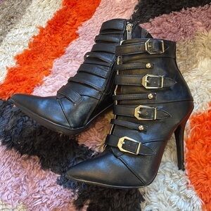 Heat Black Buckled Pointed Toe Booties​​​​